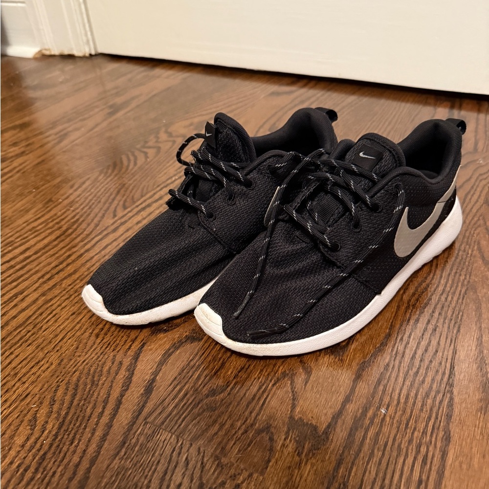 Nike Women’s Roshe One Black and White Sneakers